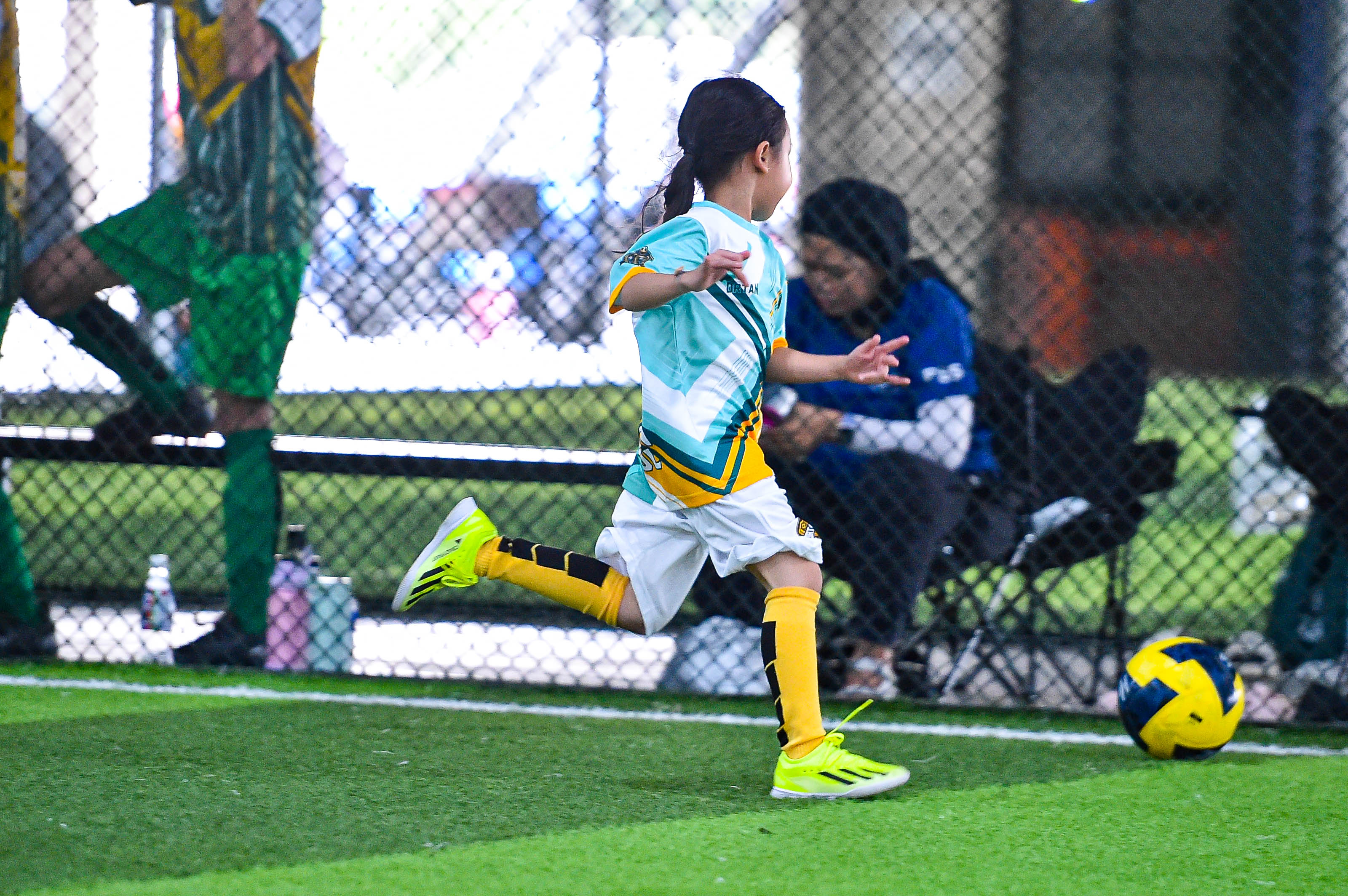 Kids playing football